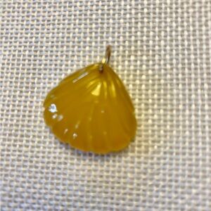 Carved Yellow Chalcedony Shell Pendant